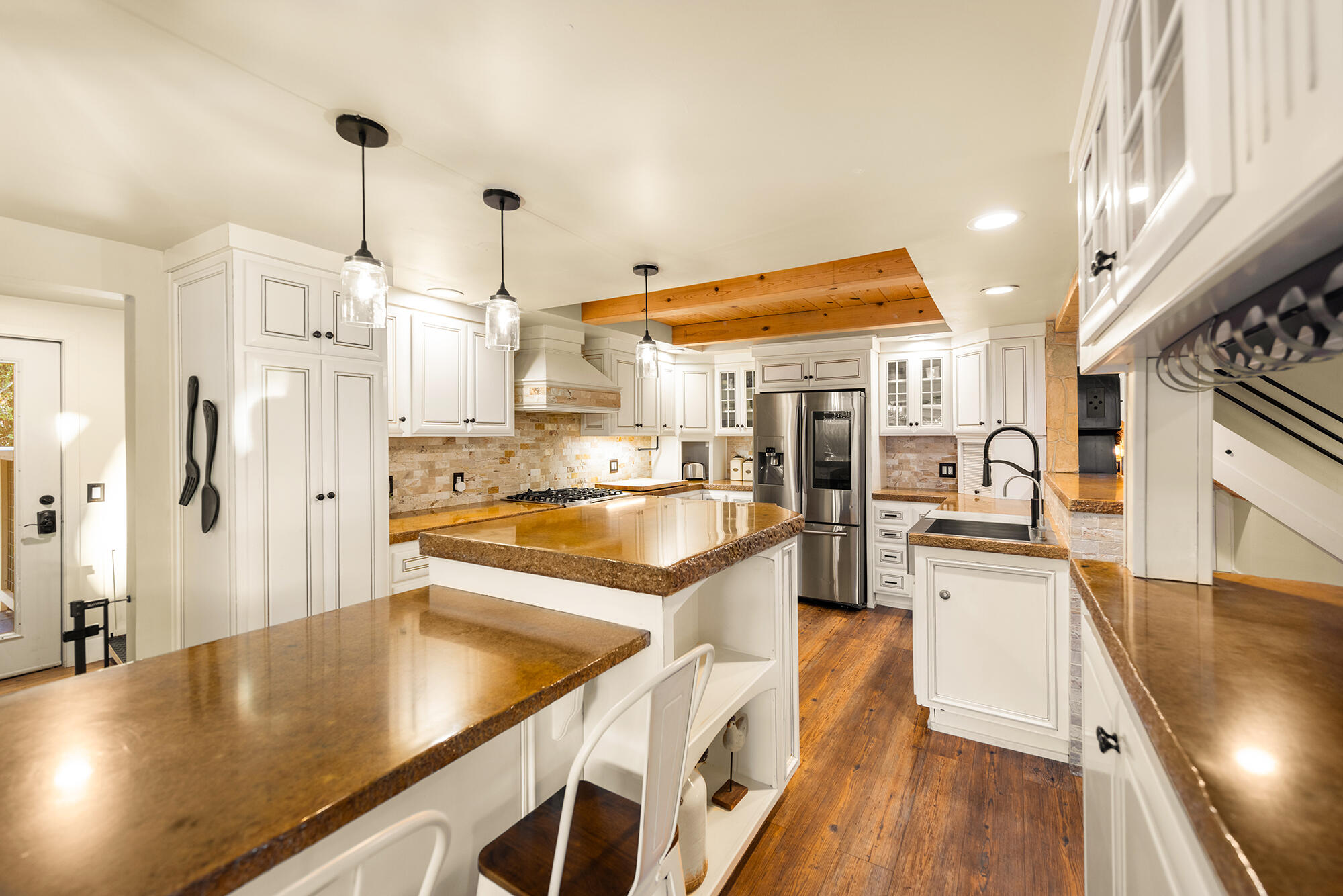 12475 Christmas Tree Road Ojai, CA 93023 - Photo 12 of 50 a view of a kitchen with kitchen island a large counter top space a sink stainless steel appliances and cabinets