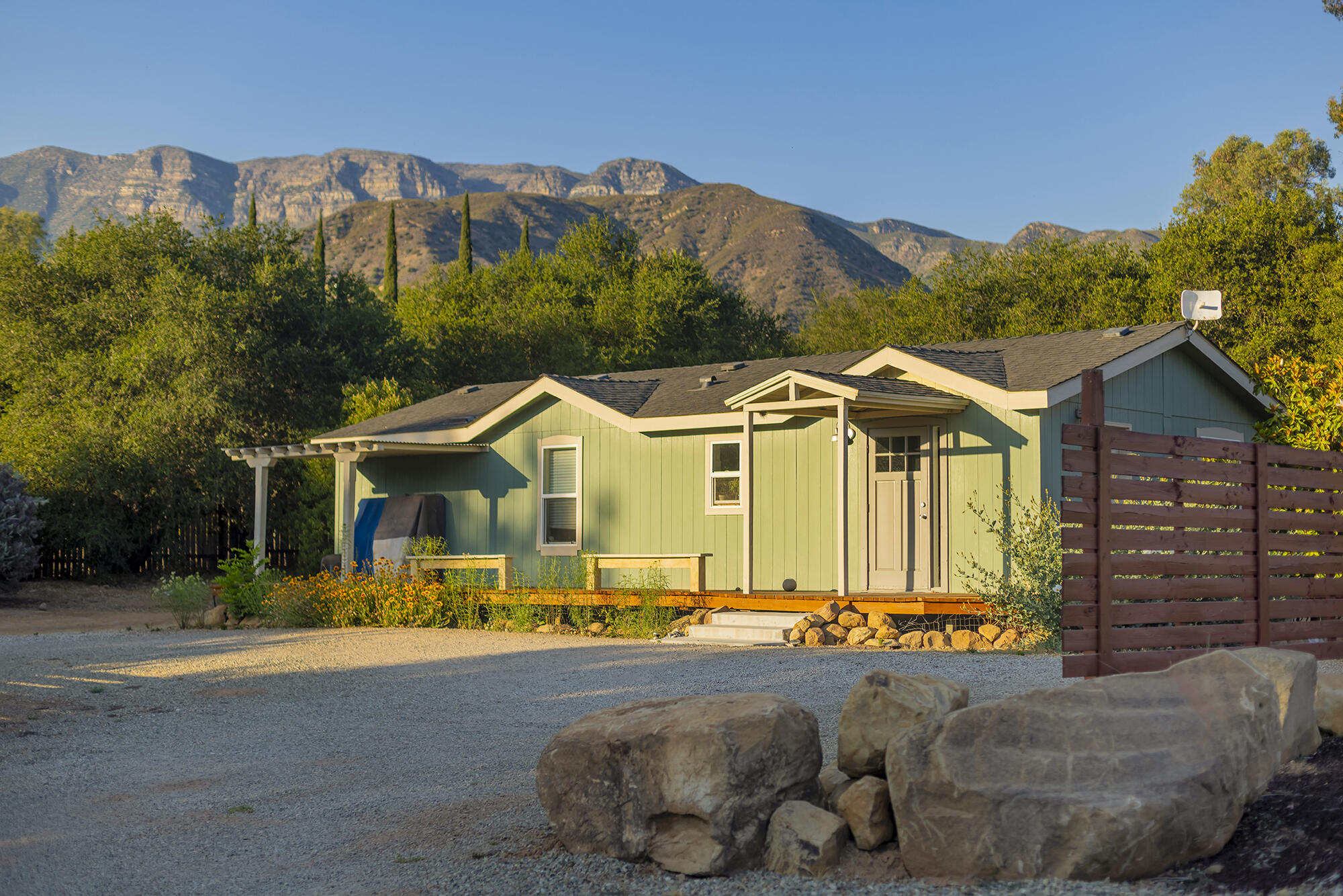12475 Christmas Tree Road Ojai, CA 93023 - Photo 36 of 50 a front view of a house with a yard and mountain view