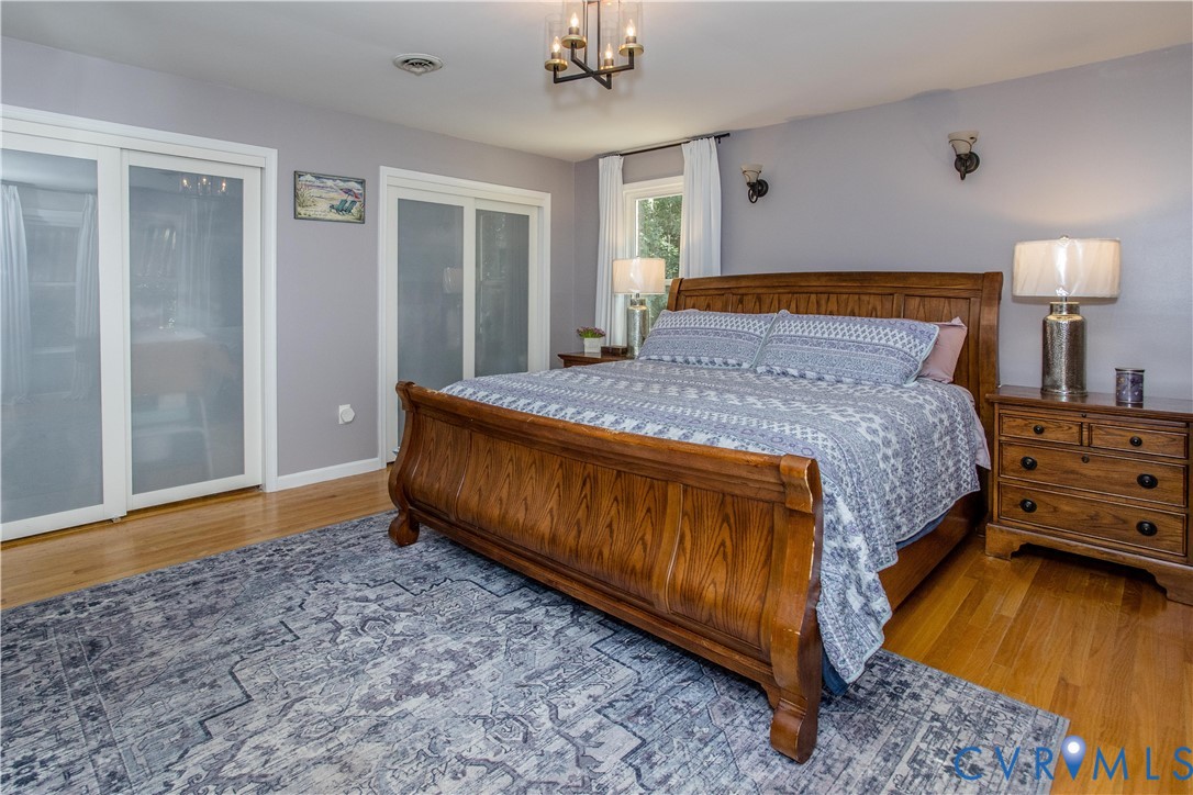 20808 Little Road Petersburg, VA 23803 - Photo 13 of 35 Primary bedroom with double closets featuring upda
