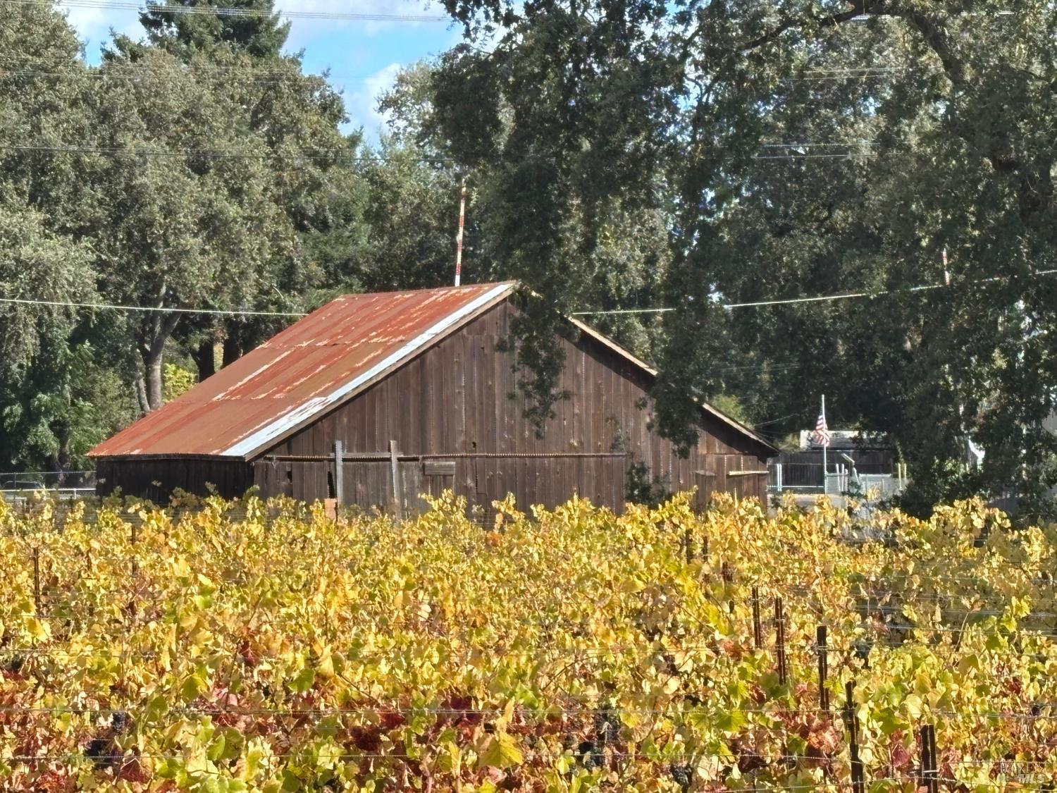 1100 Hart Lane Fulton, CA 95439 - Photo 16 of 30 a backyard with wooden fence and flowers