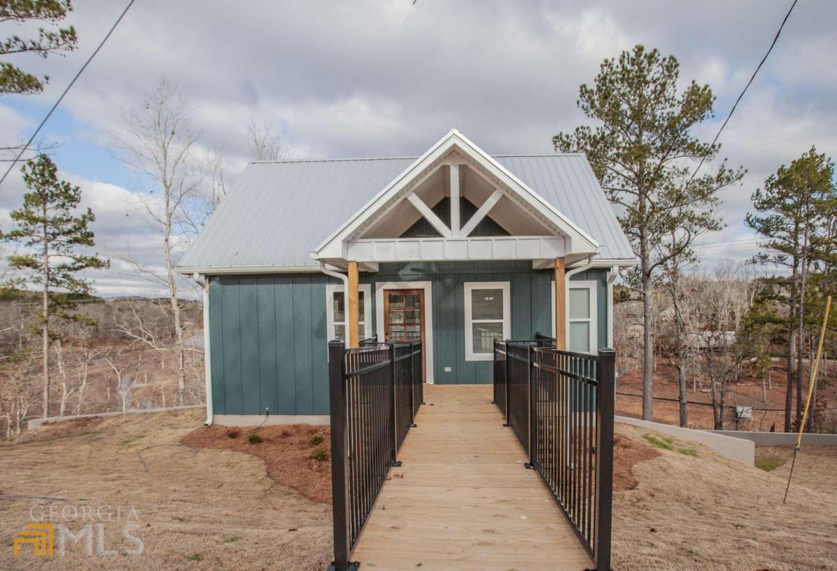 417 Pointe View Road Wedowee, AL 36278 - Photo 1 of 1 a front view of a house with a porch
