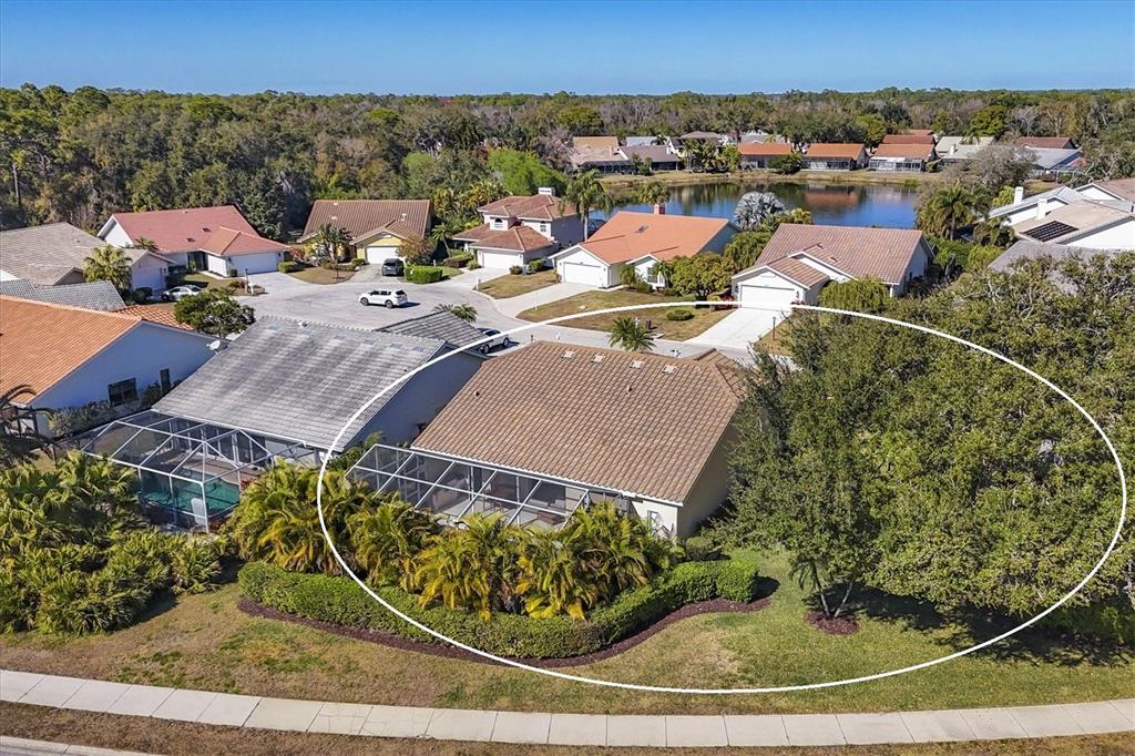 5956 Rachele Drive Sarasota, FL 34243 - Photo 33 of 37 an aerial view of a house with a yard
