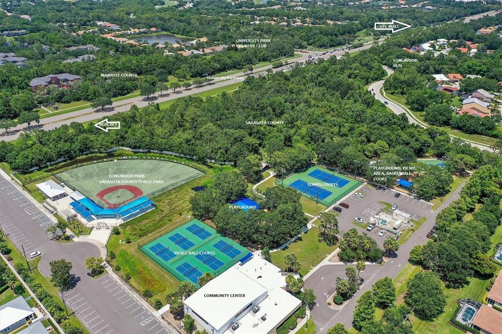5956 Rachele Drive Sarasota, FL 34243 - Photo 35 of 37 an aerial view of a residential houses with a green yard