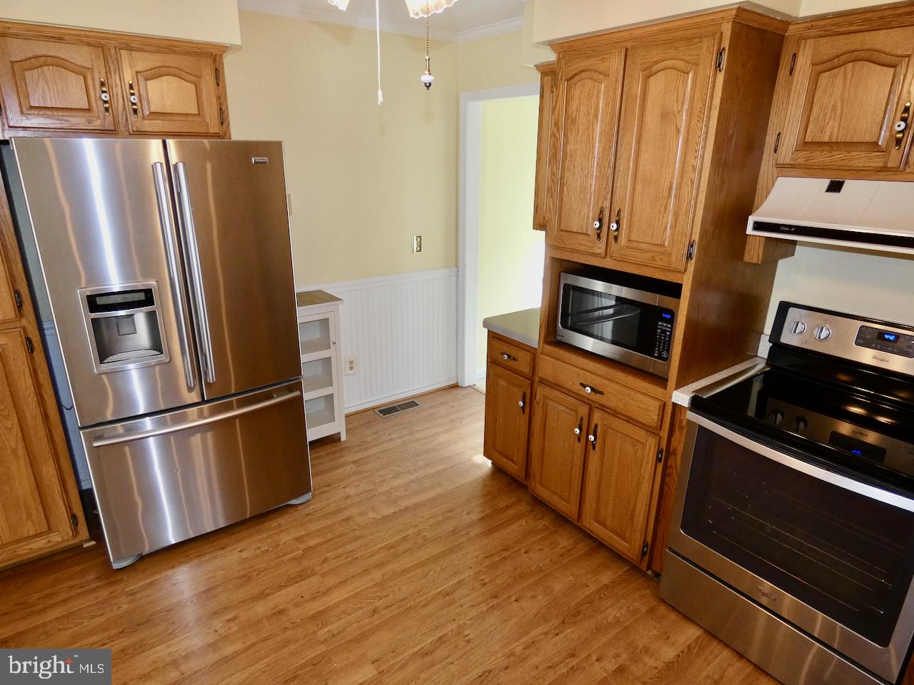 260 Clarks Corner Road New Castle, DE 19720 - Photo 19 of 85 Modern kitchen with warm wood accents.