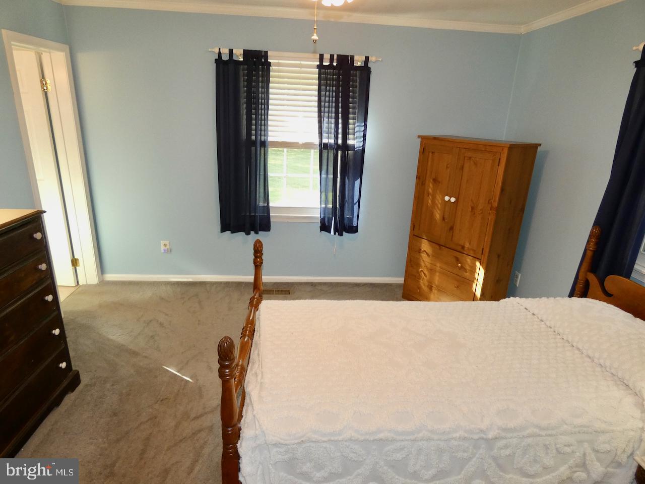 260 Clarks Corner Road New Castle, DE 19720 - Photo 29 of 85 Serene blue bedroom with natural light.
