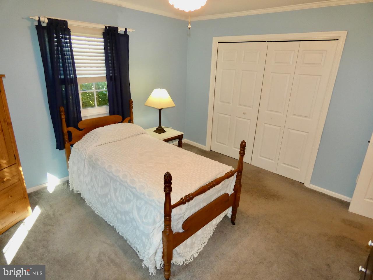 260 Clarks Corner Road New Castle, DE 19720 - Photo 32 of 85 Cozy bedroom with serene blue walls.