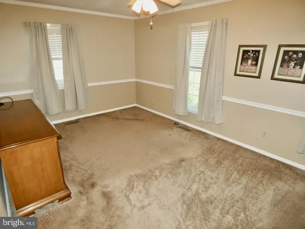 a view of porch with a floor to ceiling window