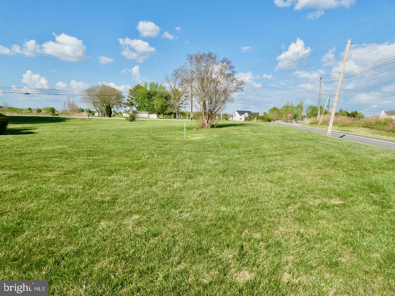 260 Clarks Corner Road New Castle, DE 19720 - Photo 76 of 85 Spacious green landscape under blue skies.