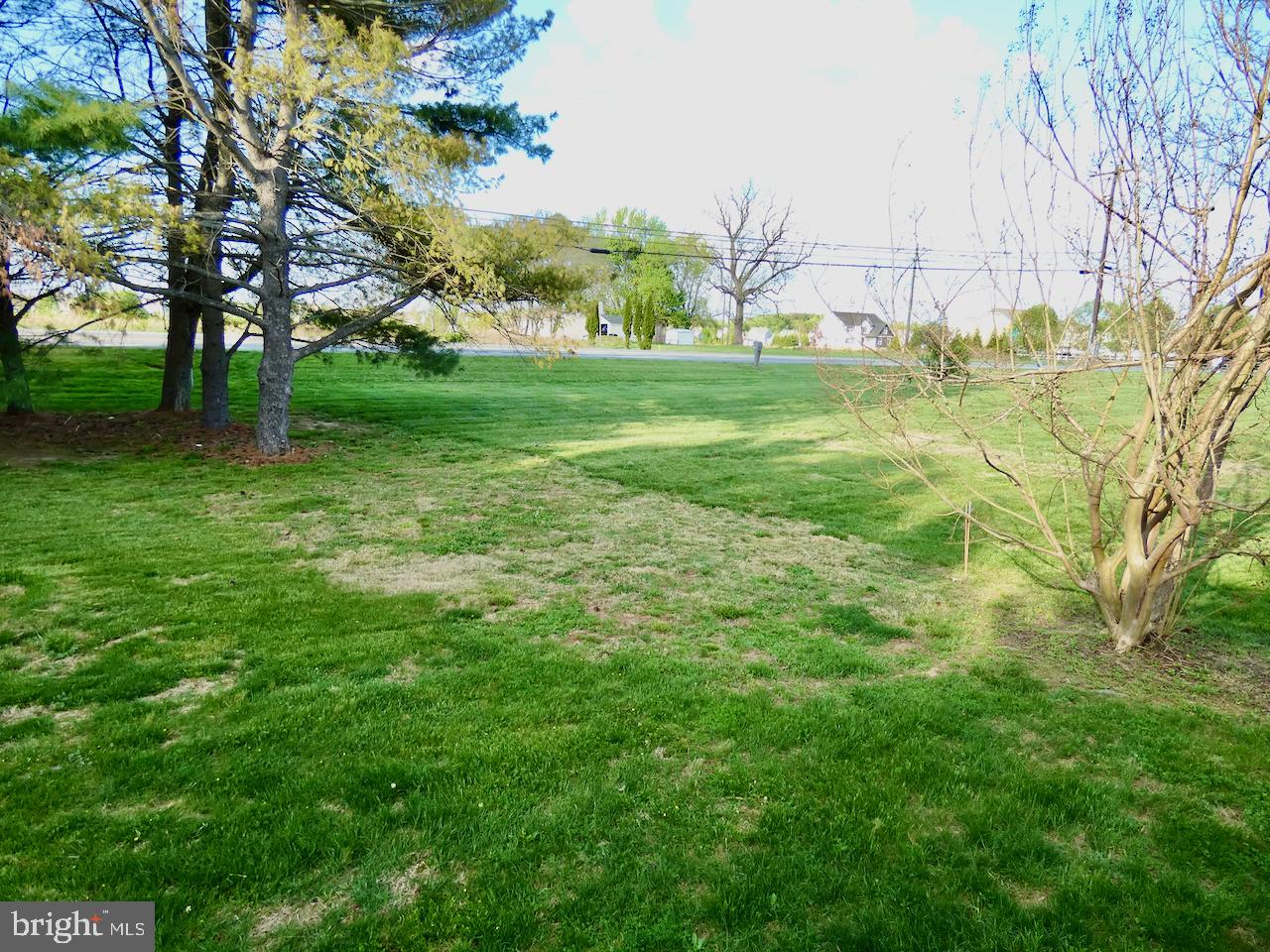260 Clarks Corner Road New Castle, DE 19720 - Photo 77 of 85 Lush green expanse under blue skies.