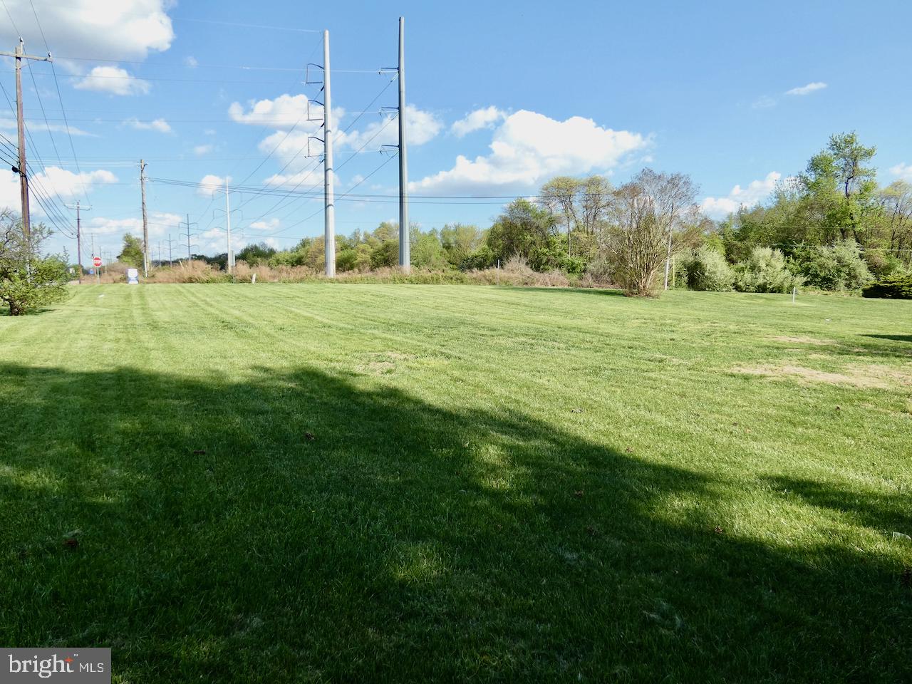 260 Clarks Corner Road New Castle, DE 19720 - Photo 78 of 85 Expansive green landscape under blue skies.