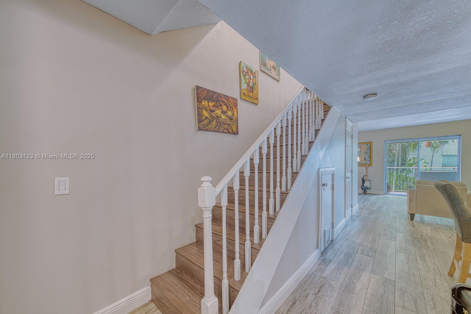 Glenvar Heights Miami, FL 33155 - Photo 14 of 30 a view of entryway with wooden floor
