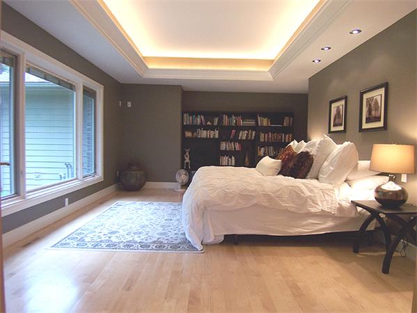 62 Prynne Ridge Road Longmeadow, MA 01106 - Photo 20 of 30 a large bed sitting in a bedroom next to a window and a lamp