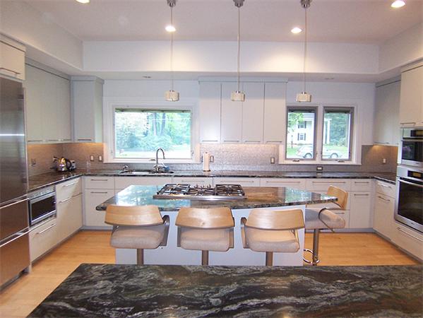 62 Prynne Ridge Road Longmeadow, MA 01106 - Photo 9 of 30 a kitchen with a stove a sink and a refrigerator