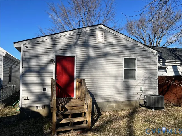a front view of a house with stairs