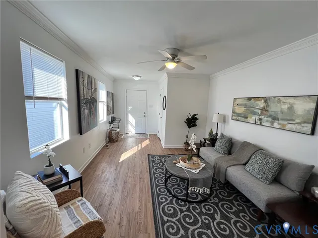 a view of a livingroom with furniture and a table