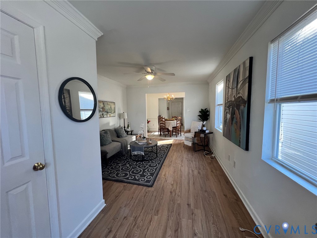 2604 Perry Street Richmond, VA 23225 - Photo 6 of 30 a living room with furniture and a wooden floor