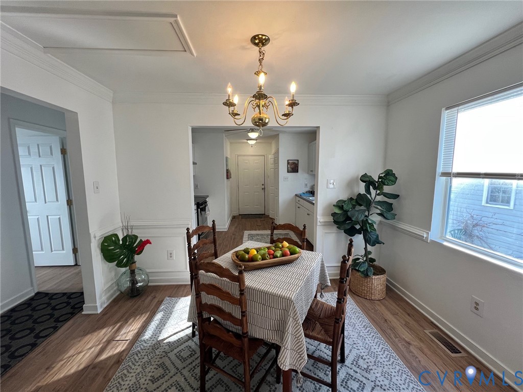 2604 Perry Street Richmond, VA 23225 - Photo 10 of 30 a dining room with furniture and window