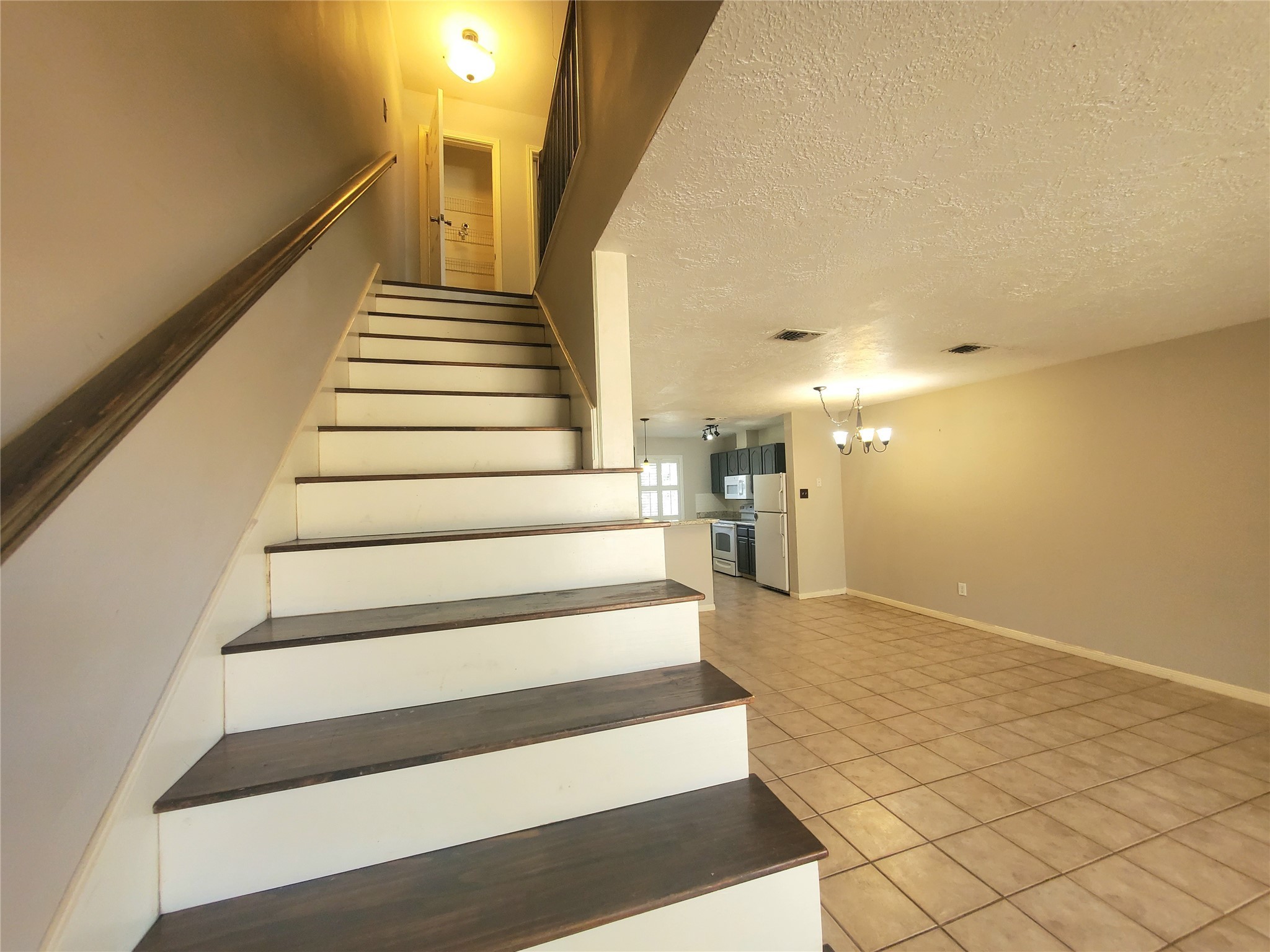 2030 Plantation Drive, Unit B2 Conroe, TX 77301 - Photo 12 of 20 a view of entryway and hall with wooden floor