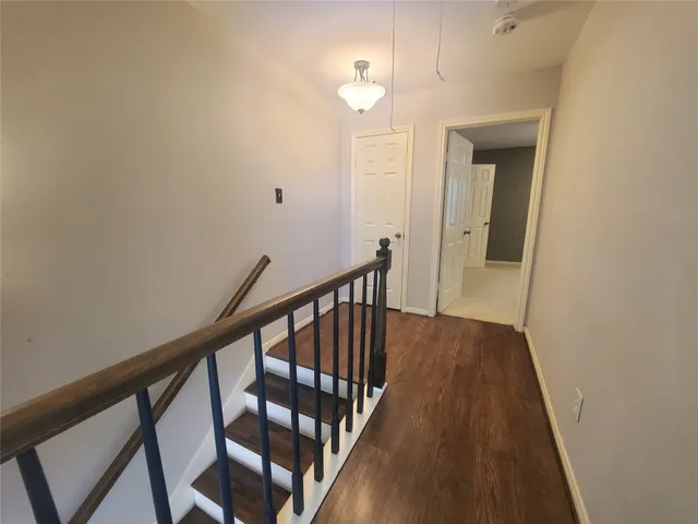 a bathroom with a double vanity sink mirror and shower