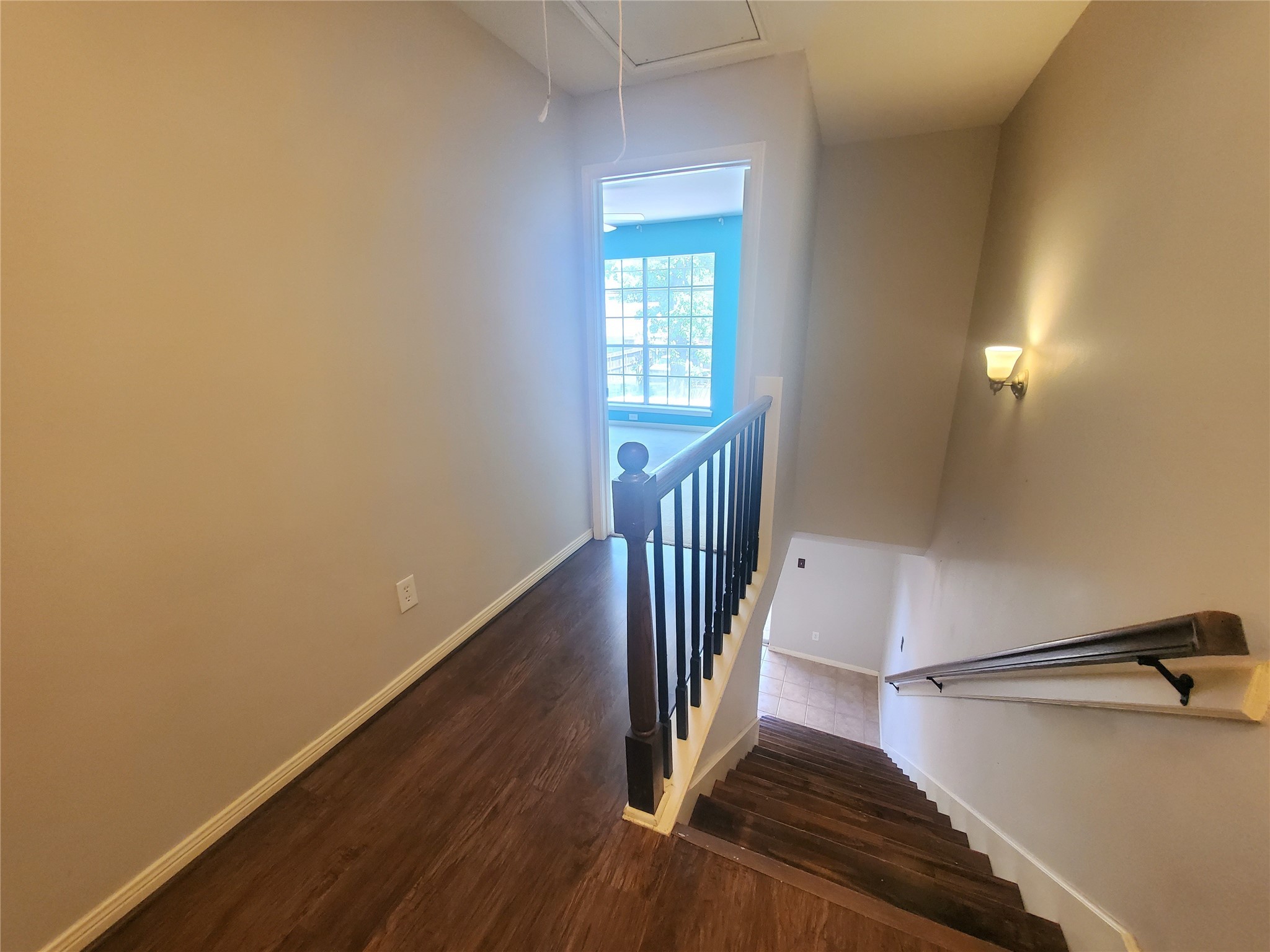2030 Plantation Drive, Unit B2 Conroe, TX 77301 - Photo 16 of 20 a view of entryway with wooden floor