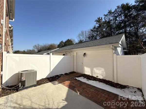 a view of a back yard of the house