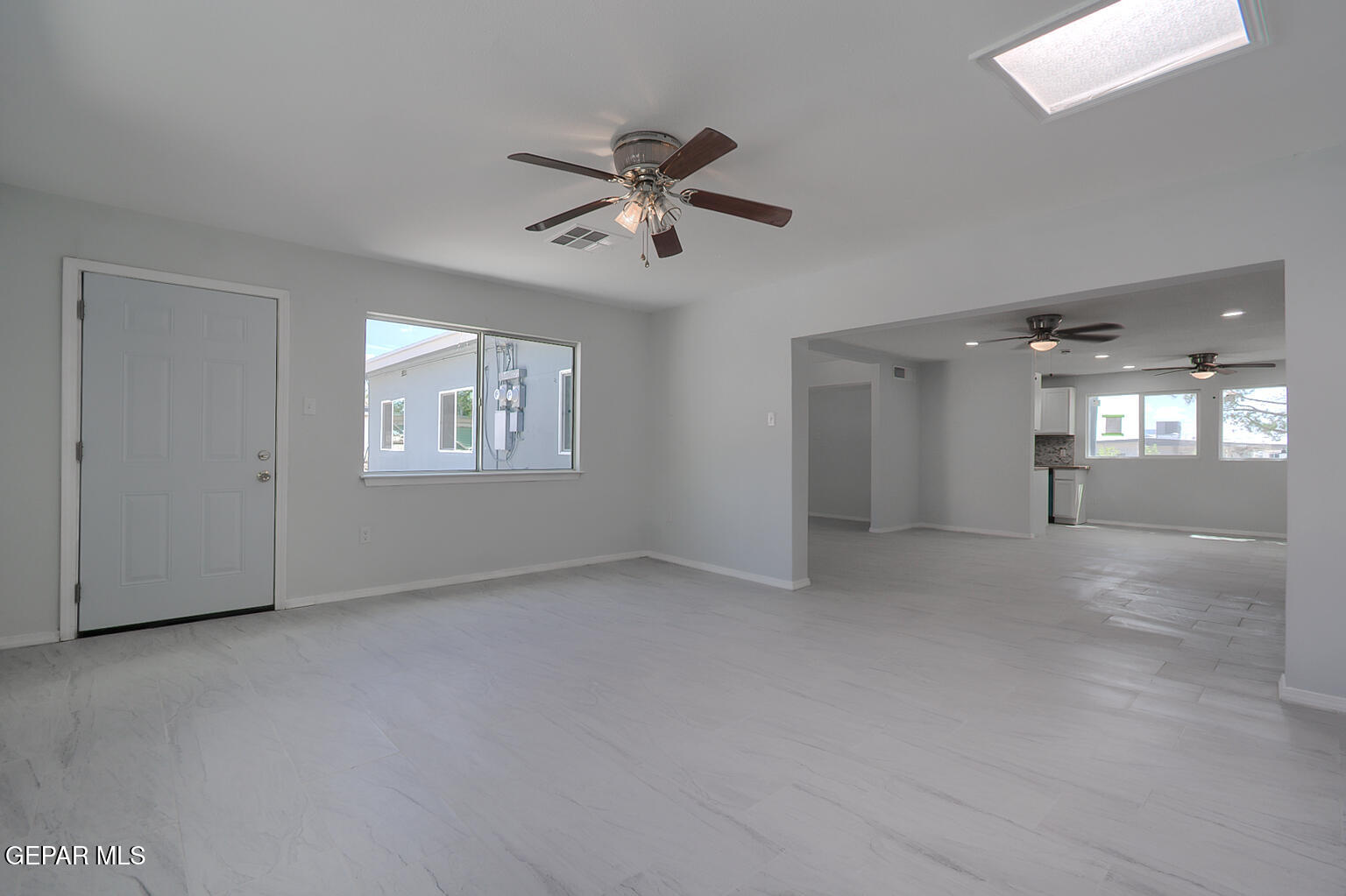 6247 Arapaho Road El Paso, TX 79905 - Photo 12 of 43 a view of an empty room with a window
