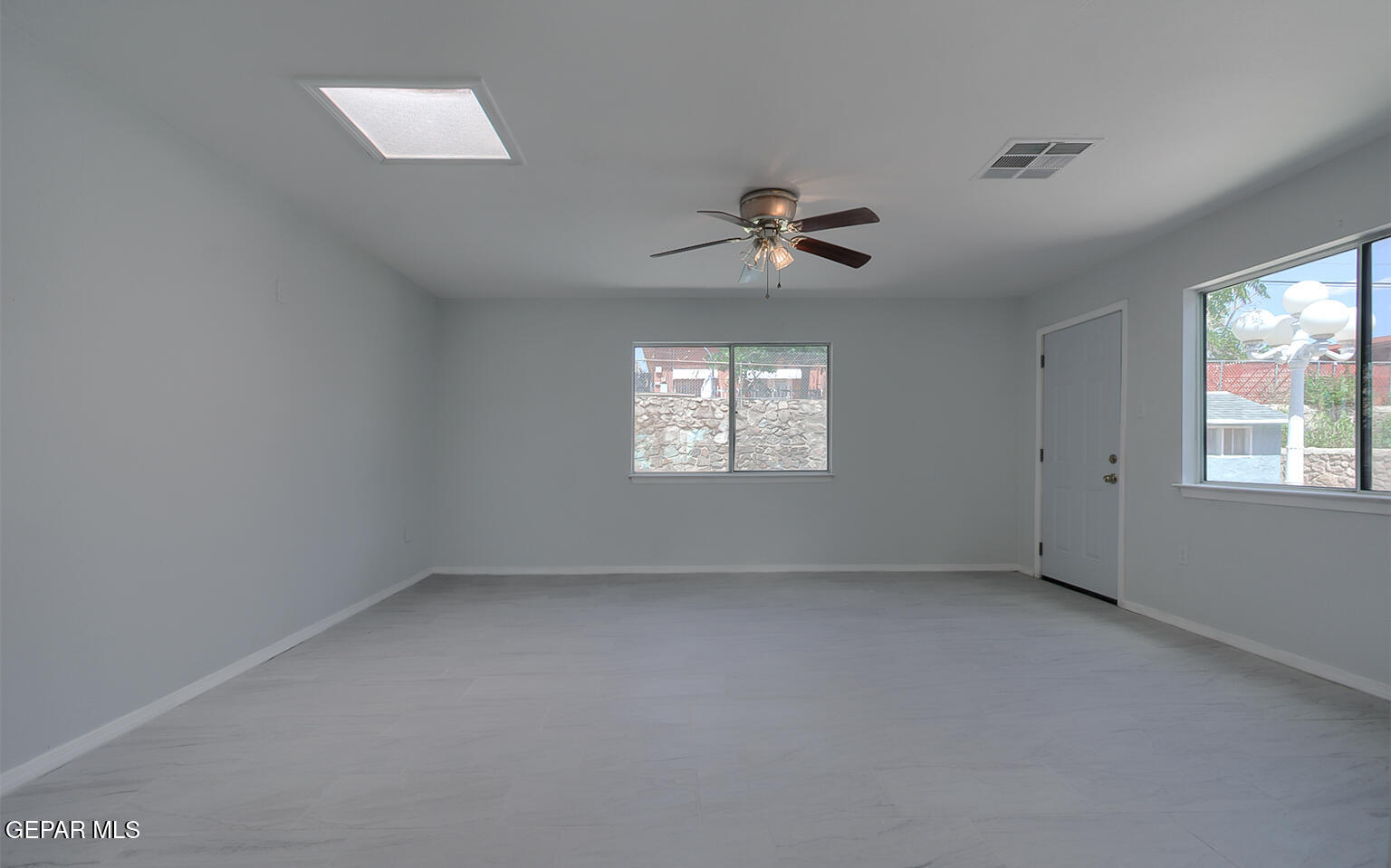 6247 Arapaho Road El Paso, TX 79905 - Photo 13 of 43 a view of an empty room with a window