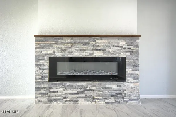 a room with a fireplace