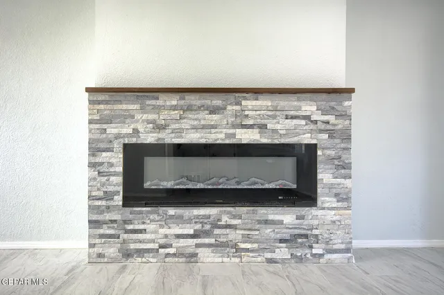 a room with a fireplace