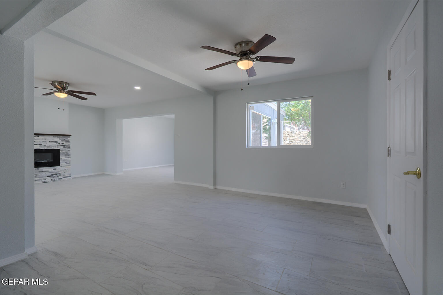 6247 Arapaho Road El Paso, TX 79905 - Photo 41 of 43 a view of empty room with windows