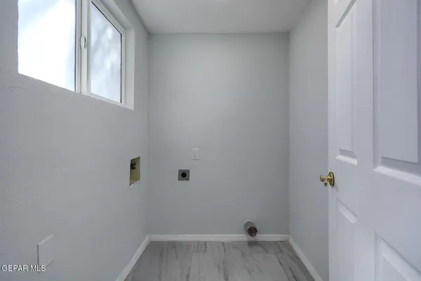 a stove top oven sitting inside of a kitchen