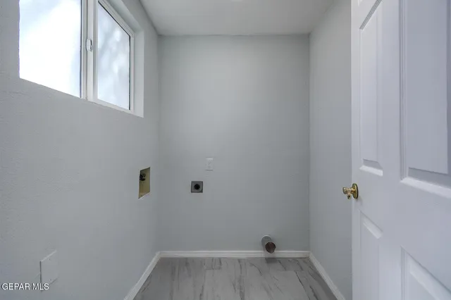 a stove top oven sitting inside of a kitchen