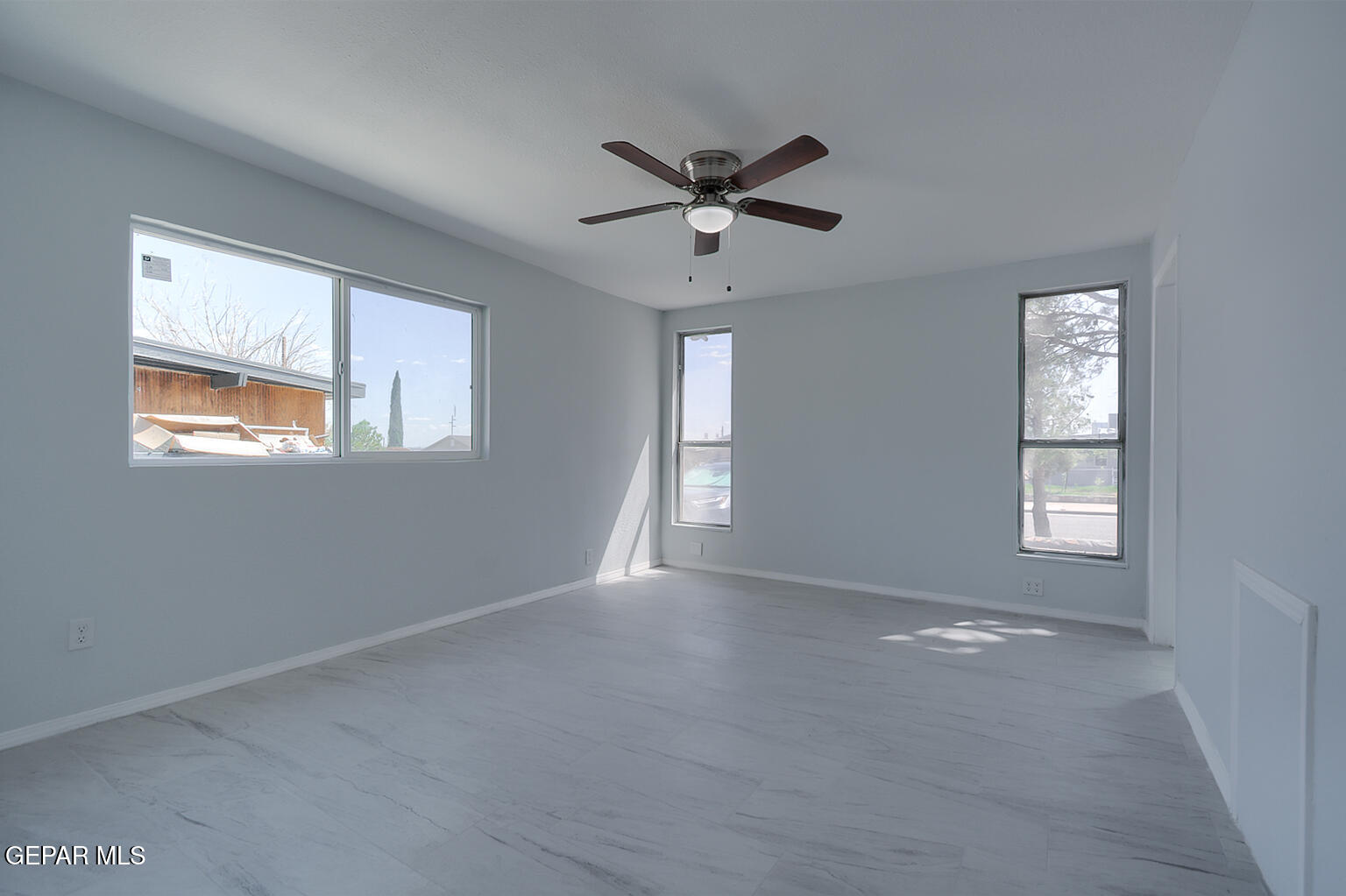 6247 Arapaho Road El Paso, TX 79905 - Photo 32 of 43 a view of an empty room with a window