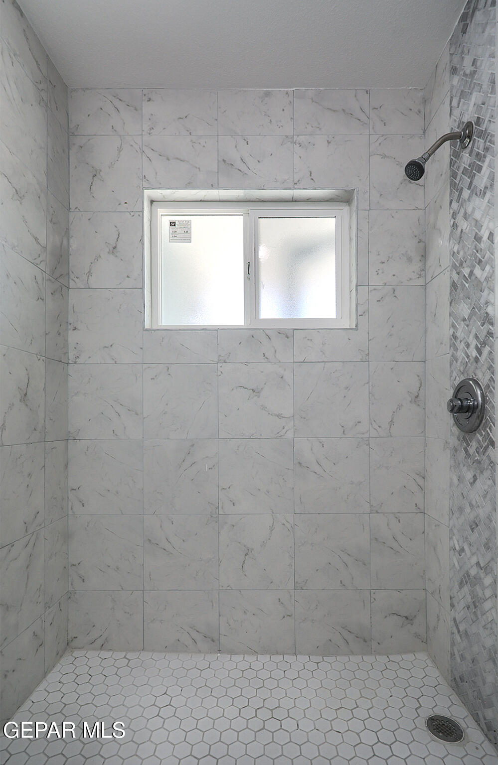 6247 Arapaho Road El Paso, TX 79905 - Photo 6 of 43 a bathroom with a window