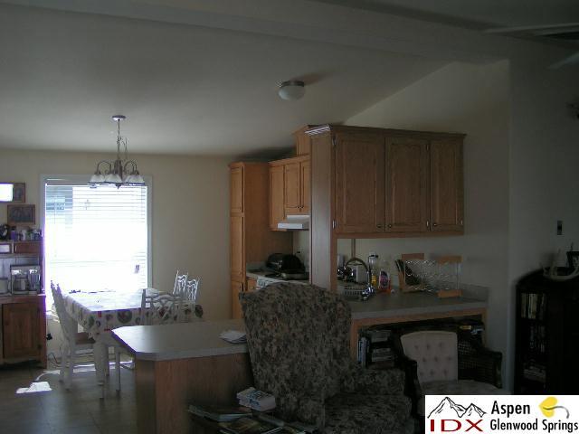 132 Daniel Rifle, CO 81650 - Photo 3 of 5 a kitchen with granite countertop lots of counter top space