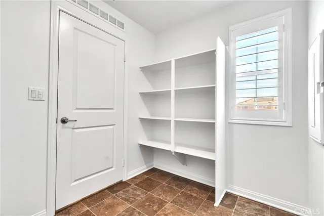 a view of a room with rack on the wall