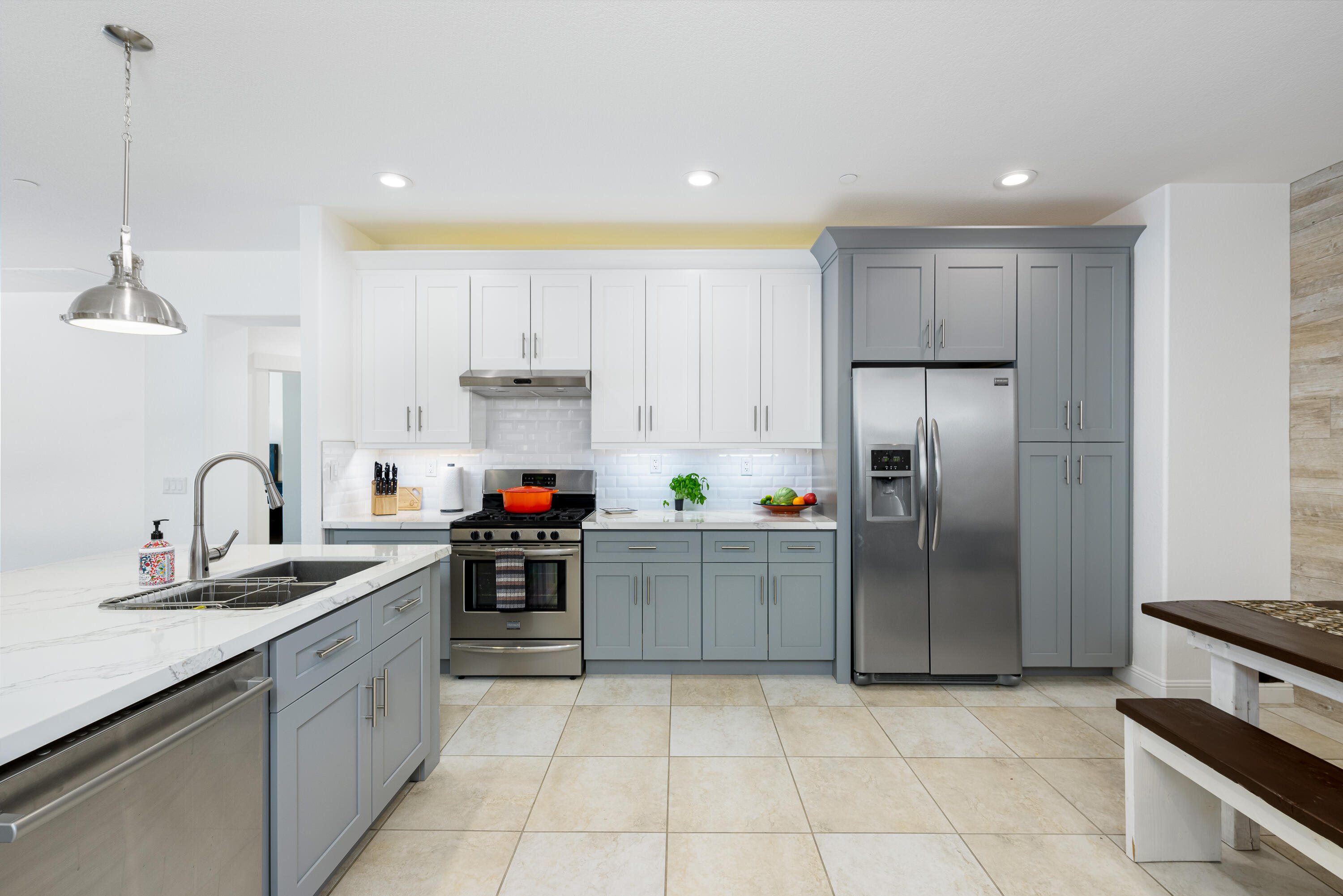 985 Alta Ridge Palm Springs, CA 92262 - Photo 22 of 44 a kitchen with a sink a refrigerator and cabinets