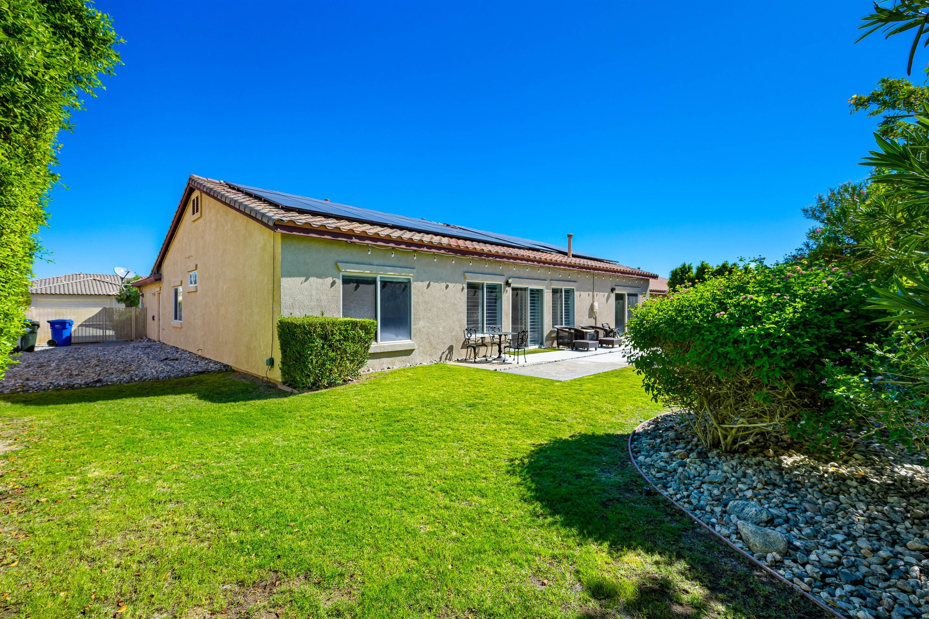 985 Alta Ridge Palm Springs, CA 92262 - Photo 26 of 44 a view of a house with a backyard