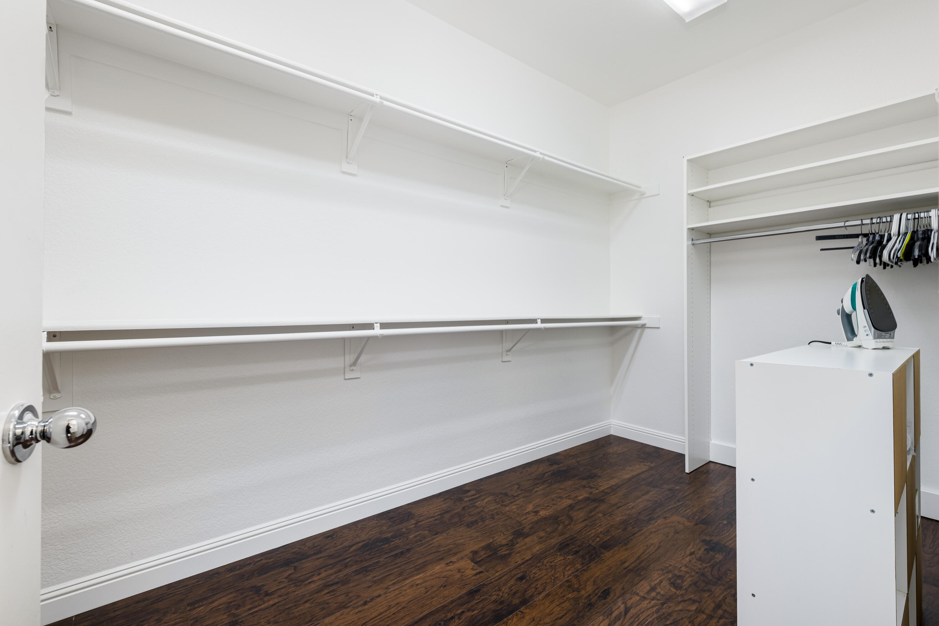 985 Alta Ridge Palm Springs, CA 92262 - Photo 34 of 44 a view of storage and utility room with wooden floor