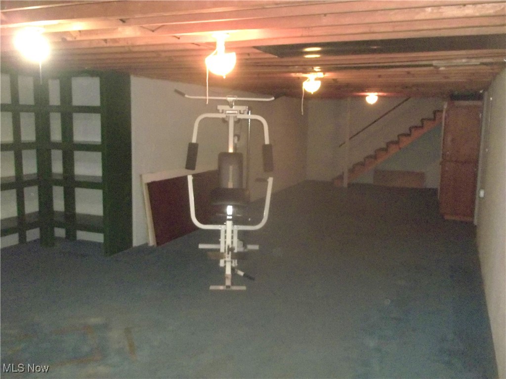 373 May Valley Road Southwest New Philadelphia, OH 44663 - Photo 34 of 38 Basement featuring carpet