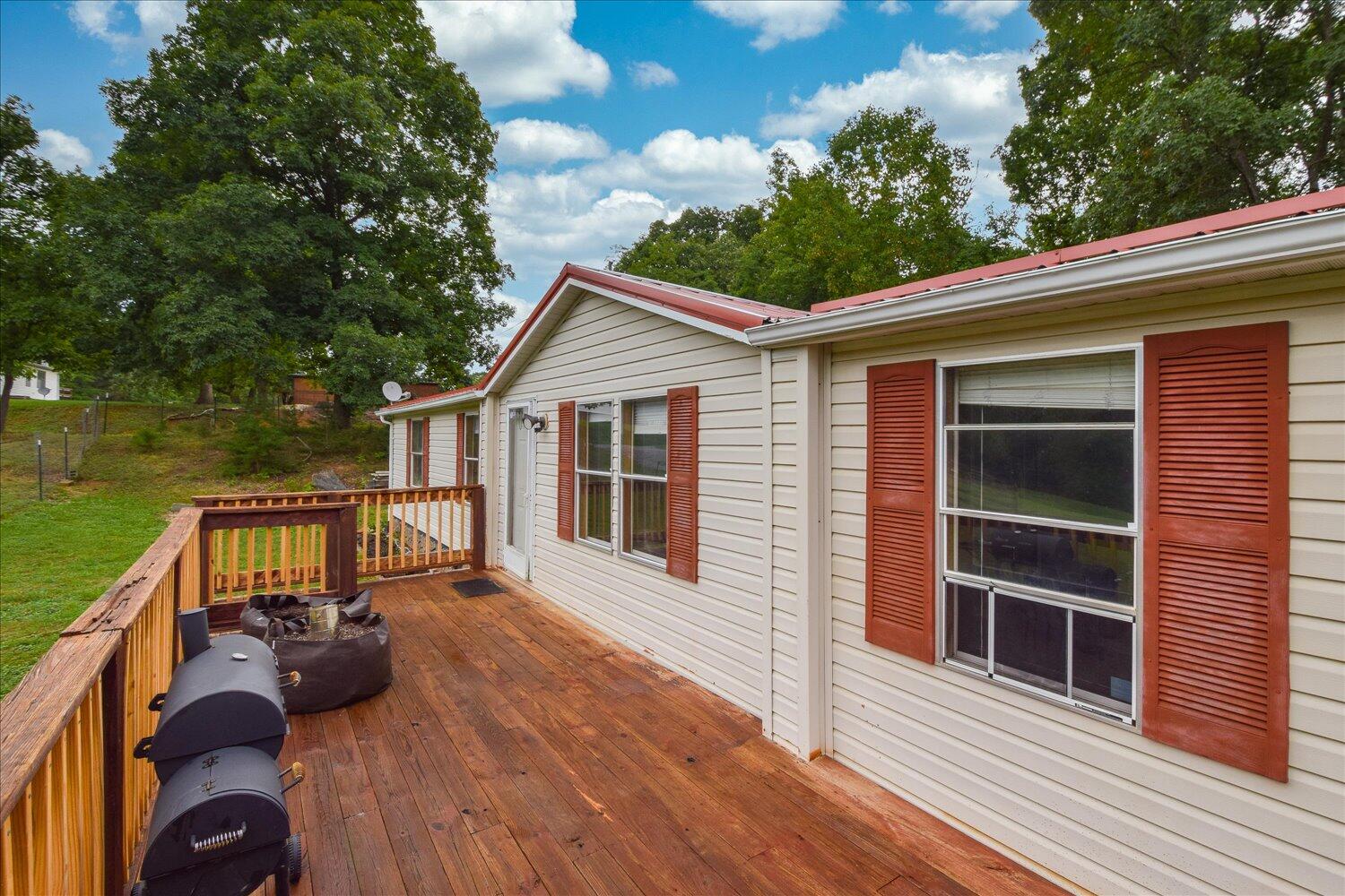 6423 Meacham Road Salem, VA 24153 - Photo 20 of 29 a view of a house with backyard and sitting area