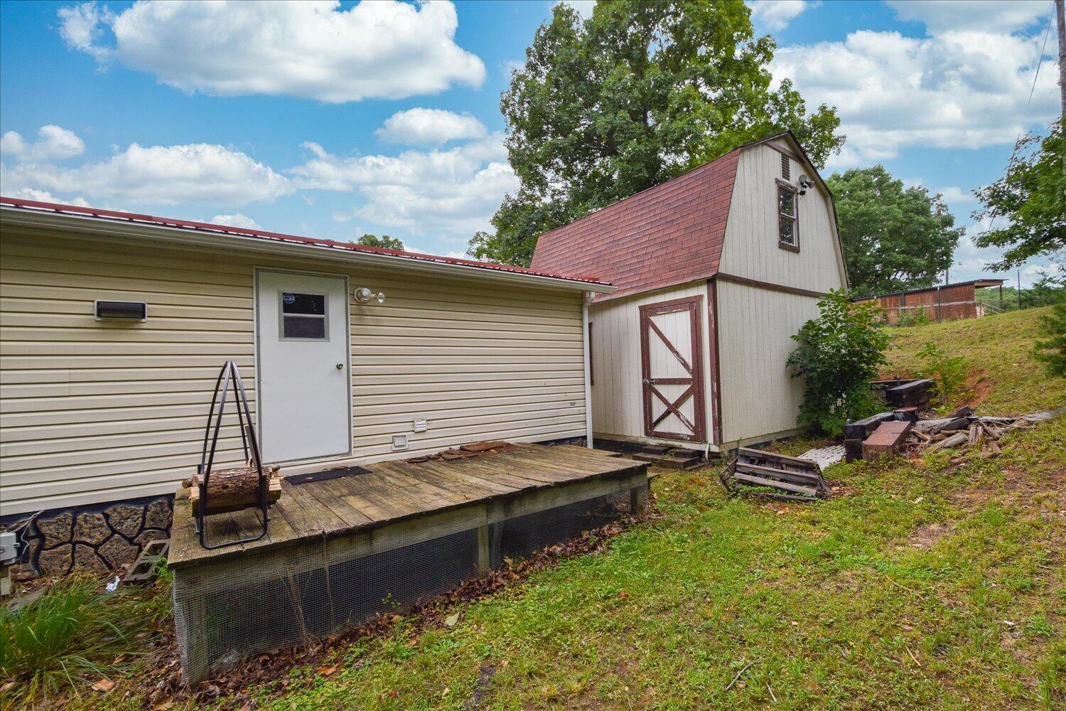 6423 Meacham Road Salem, VA 24153 - Photo 22 of 29 a backyard of a house with lots of green space