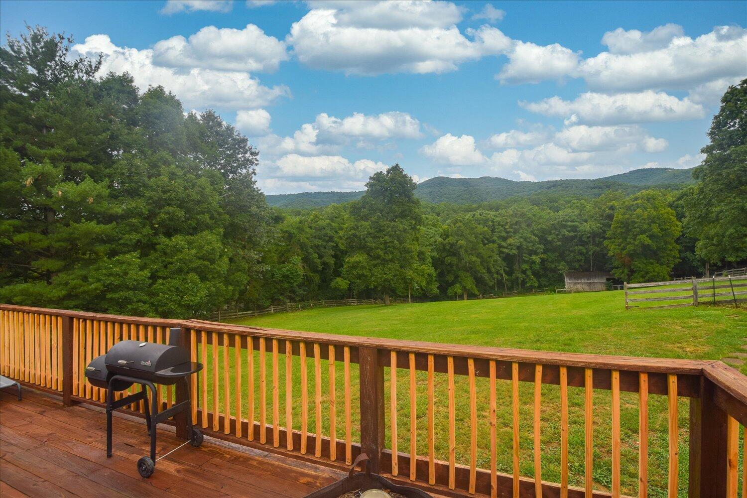 6423 Meacham Road Salem, VA 24153 - Photo 24 of 29 a balcony with wooden floor in back