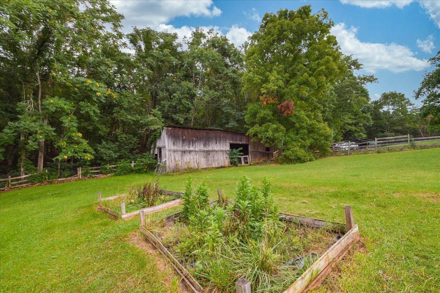 6423 Meacham Road Salem, VA 24153 - Photo 29 of 29 a backyard of a house with yard and trampoline