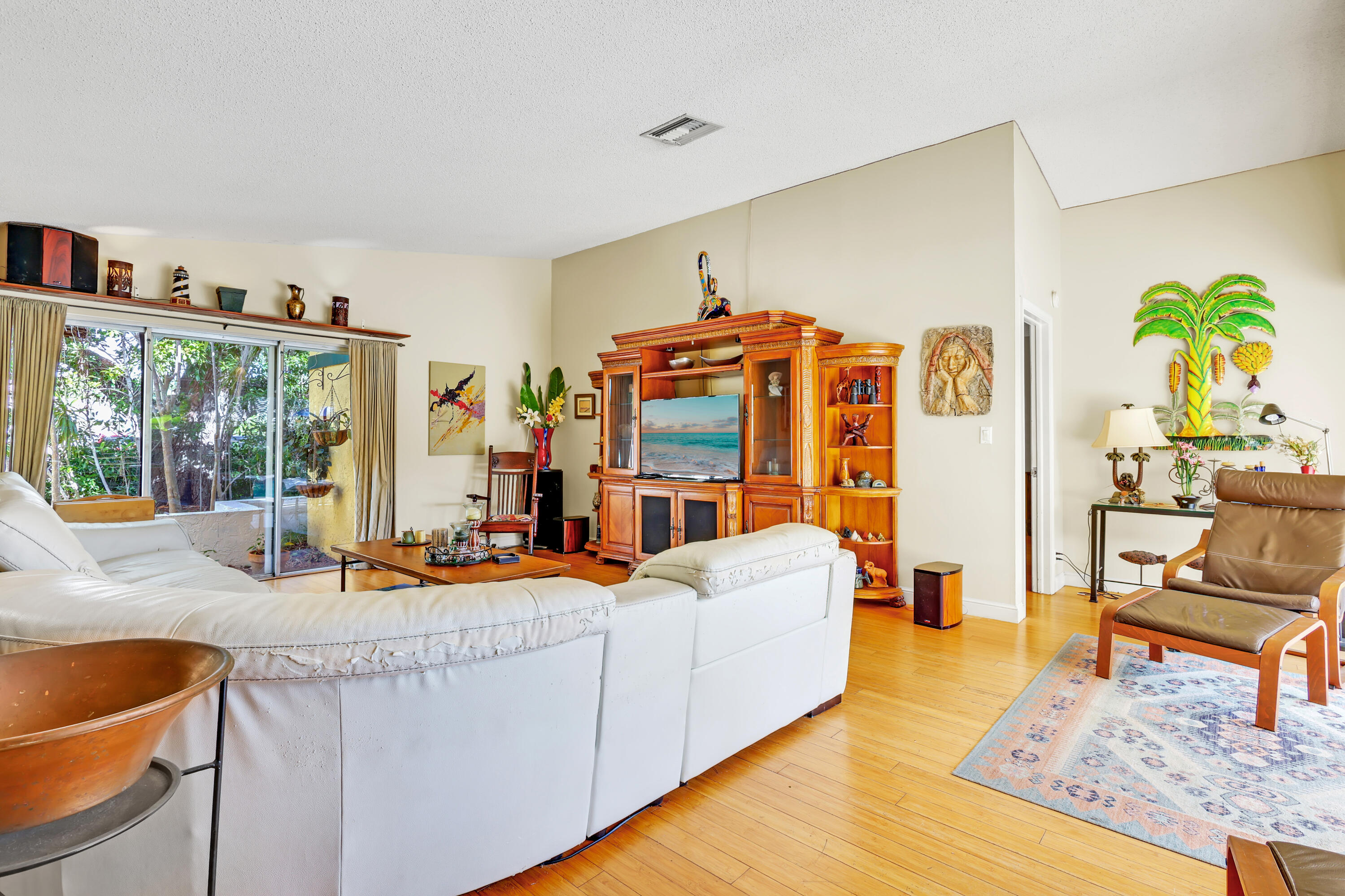 1440 Southwest 20th Street Boca Raton, FL 33486 - Photo 14 of 45 a living room with furniture and a large window