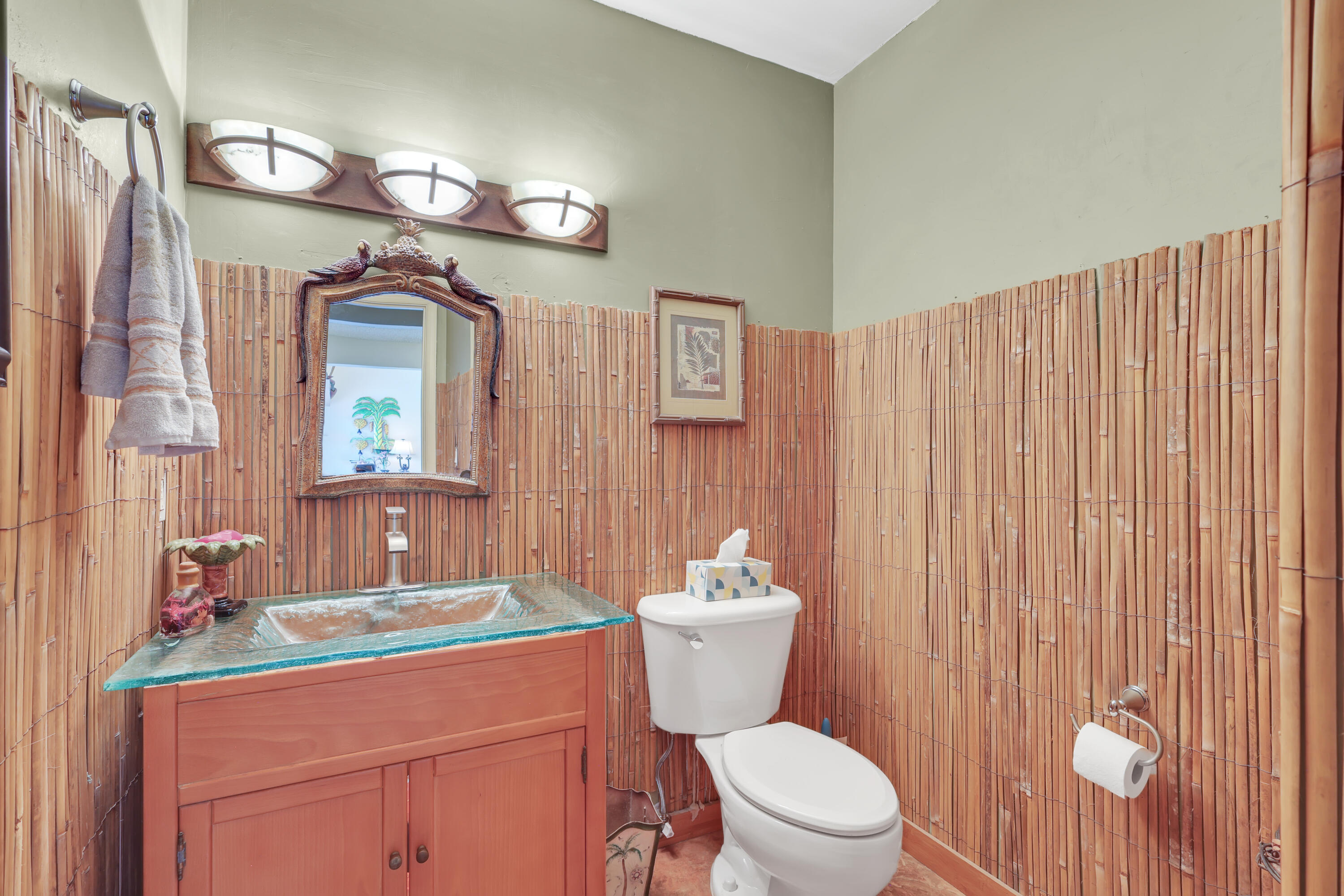 1440 Southwest 20th Street Boca Raton, FL 33486 - Photo 26 of 45 a bathroom with a toilet a sink and a mirror