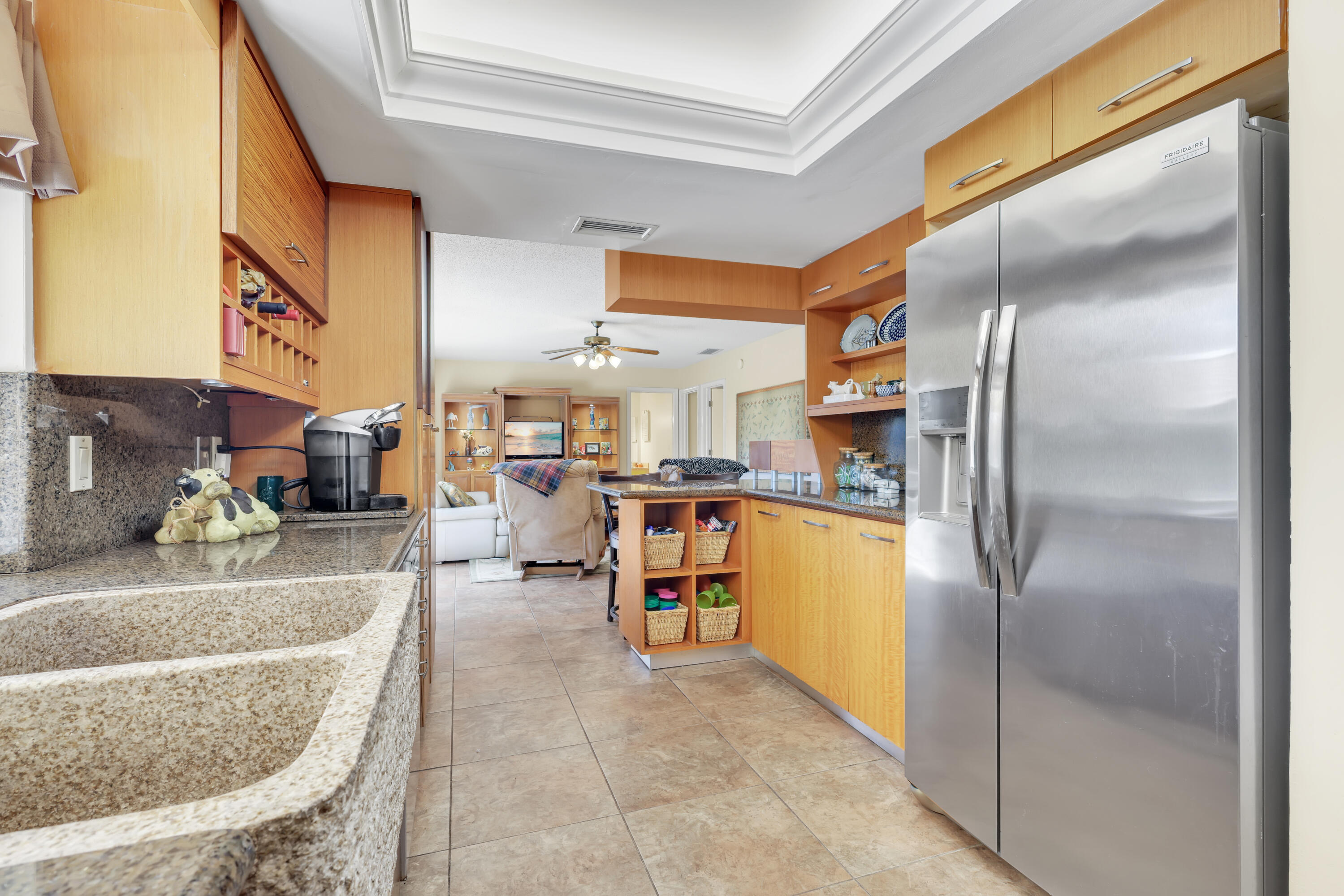 1440 Southwest 20th Street Boca Raton, FL 33486 - Photo 6 of 45 a kitchen with stainless steel appliances granite countertop a refrigerator and a sink
