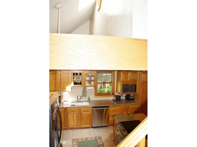 27 Mill Pond Road Exeter, RI 02822 - Photo 13 of 18 Kitchen. Cathedral ceiling and skylight in kitchen