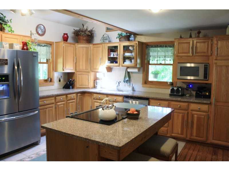 27 Mill Pond Road Exeter, RI 02822 - Photo 6 of 18 Kitchen. Brand new appliances & granite countertops, cathedral ceiling with skylight!