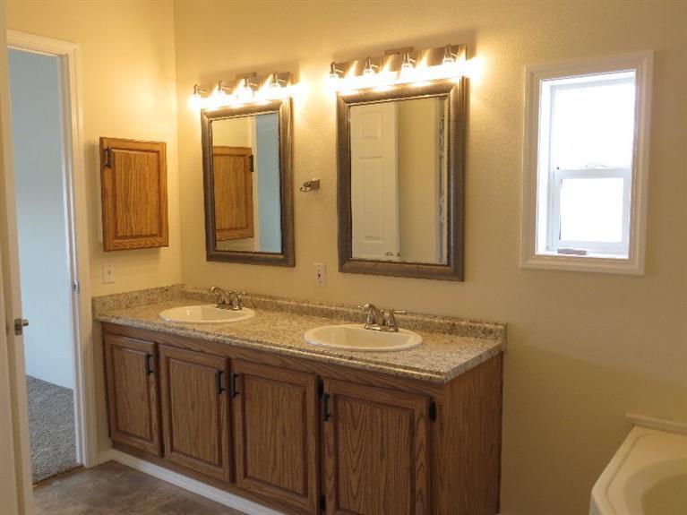11800 Perry Road White City, OR 97503 - Photo 20 of 35 a bathroom with a sink and a mirror